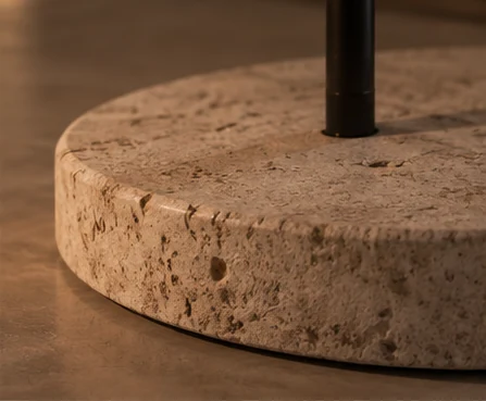 Detail of the unpolished Campaspero stone base of GRAVITA Arco